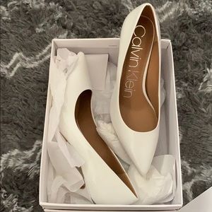 Calvin Klien White Patten Leather Pumps